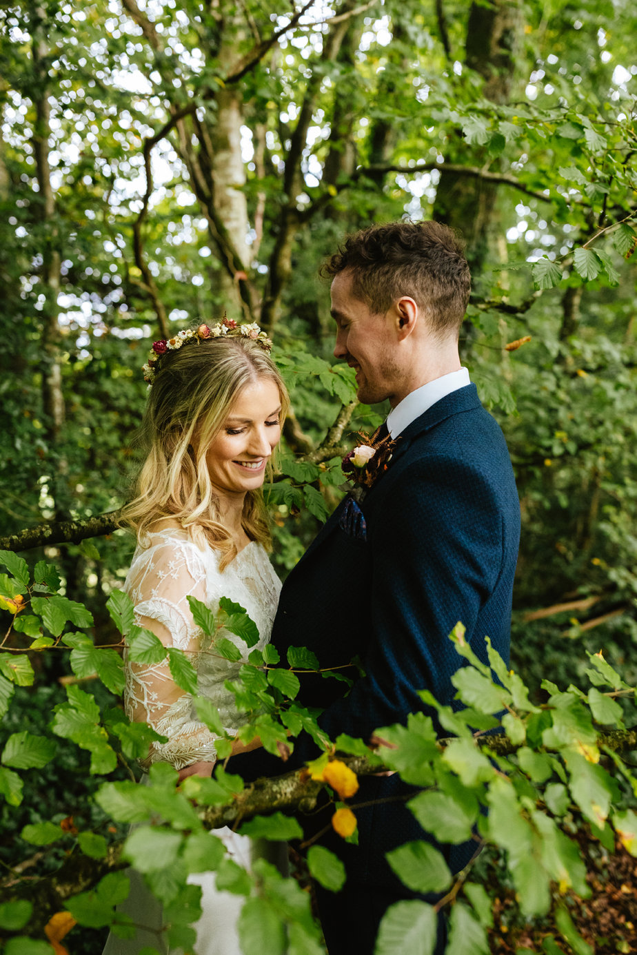 Bride groom autumnal embracing forest park