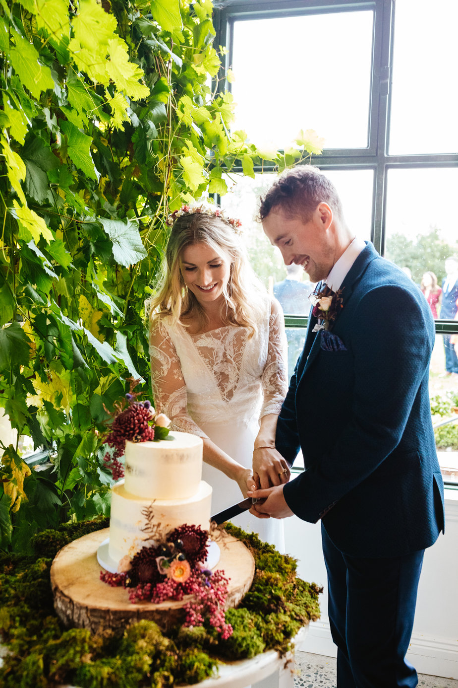 Bride and groom cut the cake