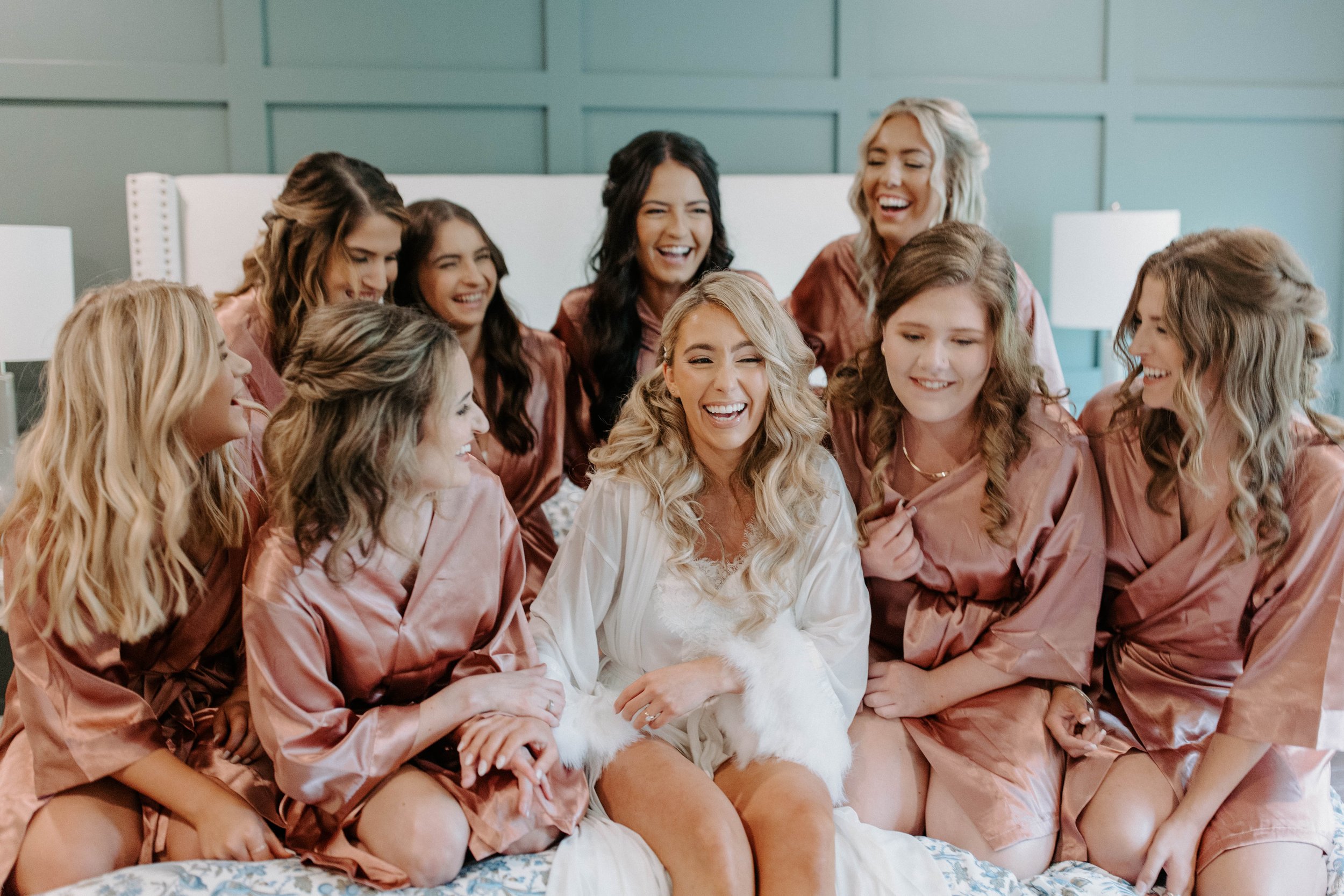 bridesmaids and bride morning of the wedding