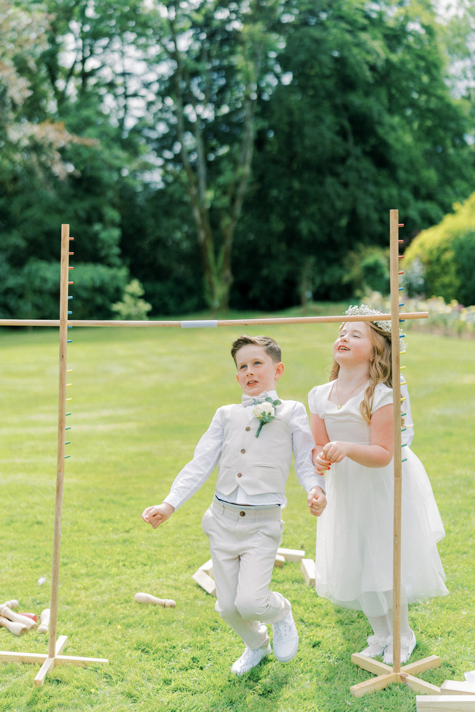 Kids playing white gown