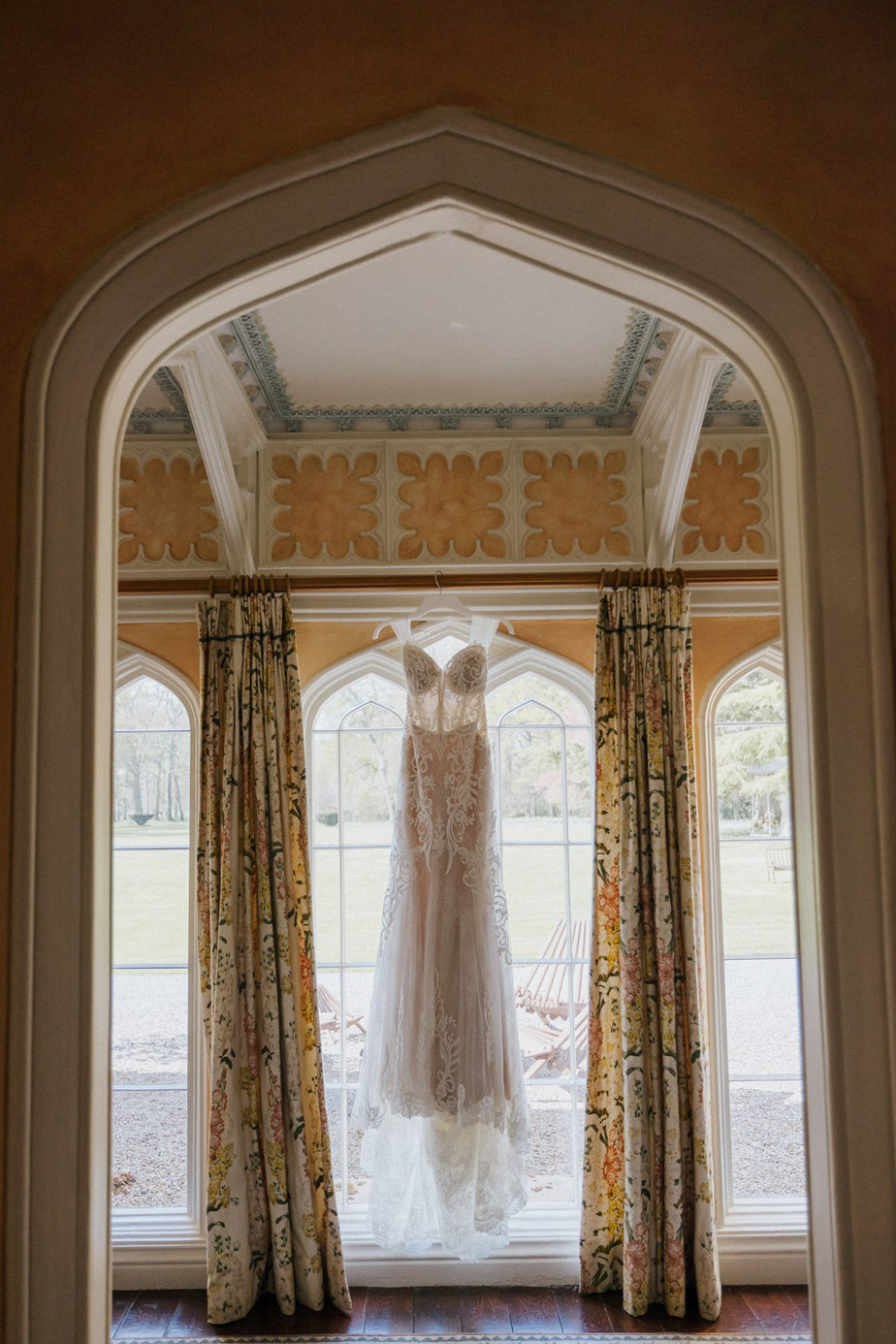 Dress hanging up in room