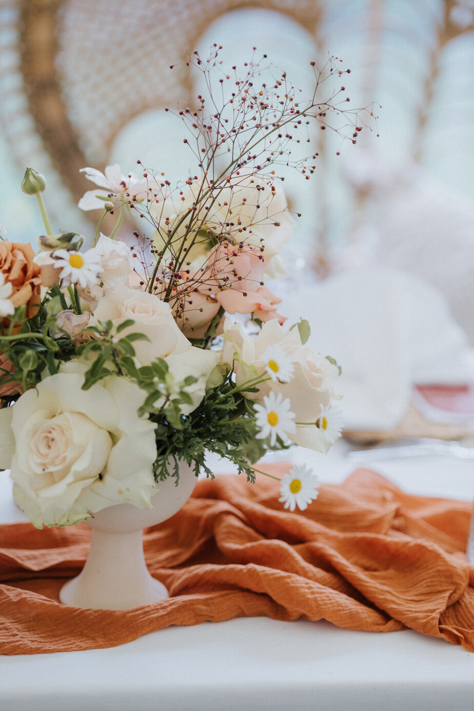 Orange themed dining room flowers roses