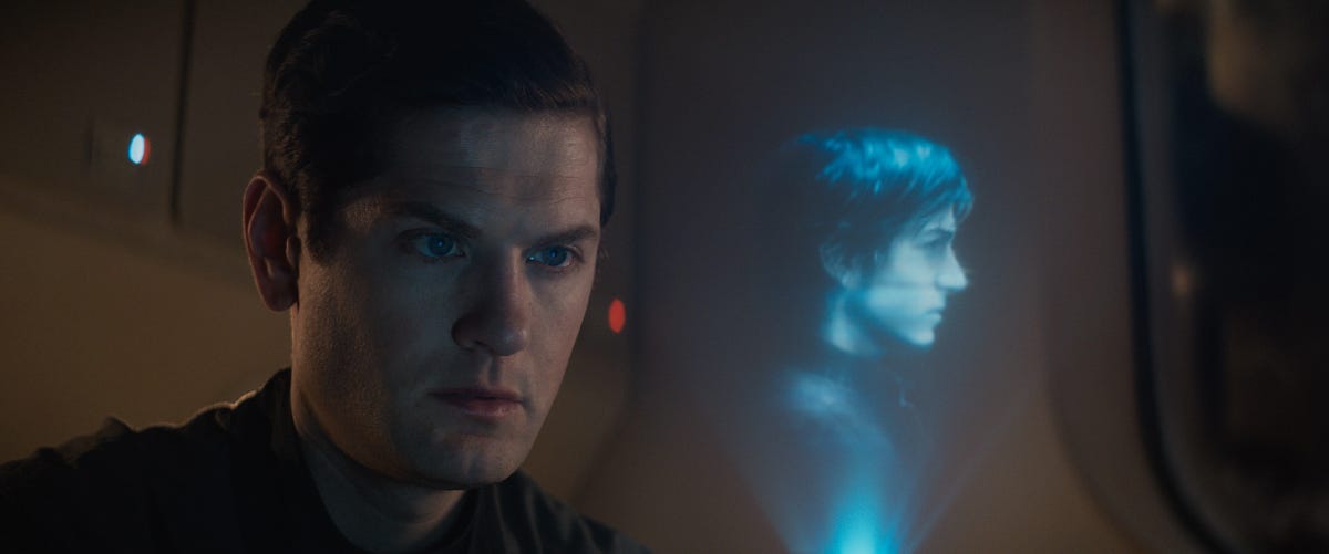 Syril Karn gazes a hologram of Cassian Andor in Andor