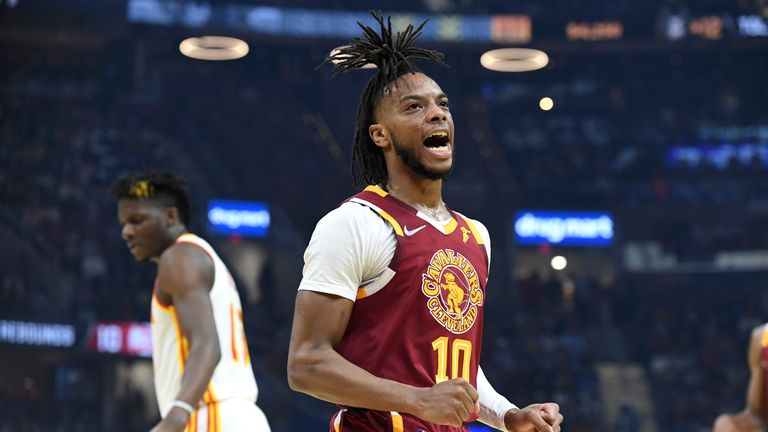 Cleveland Cavaliers' Darius Garland reacts to a basket during the first half of the team's NBA play-in basketball game against the Atlanta Hawks on Friday, April 15, 2022, in Cleveland.
