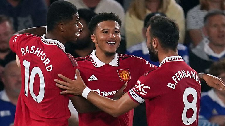 Jadon Sancho is congratulated by Marcus Rashford and Bruno Fernandes after scoring Manchester United's opener at Leicester