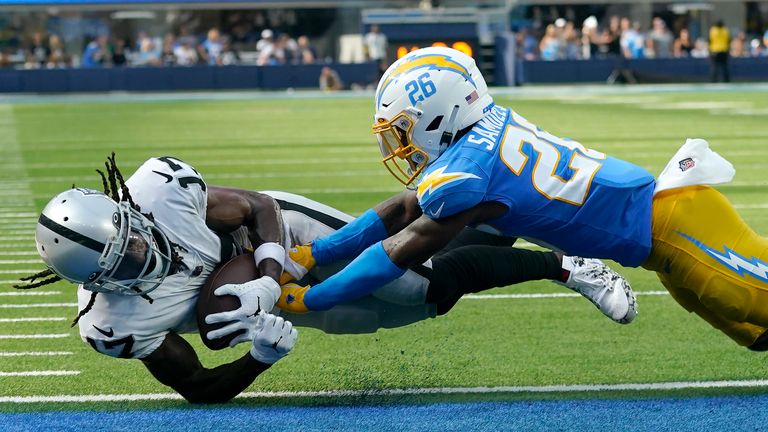 Las Vegas Raiders wide receiver Davante Adams' first touchdown for the team was a stunning fingertip grab in crunch time
