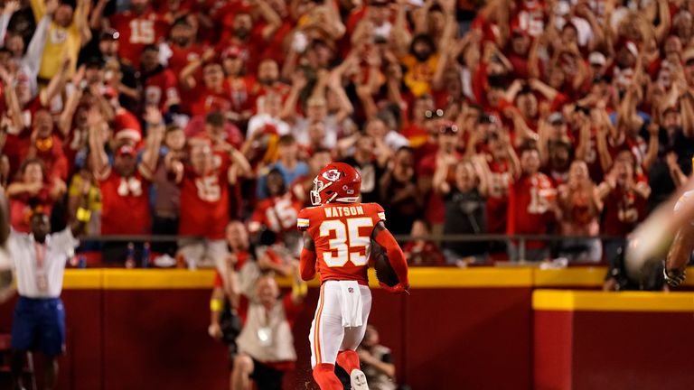 Kansas City Chiefs cornerback Jaylen Watson intercepts a pass from Los Angeles Chargers quarterback Justin Herbert and returns it for a 99-yard touchdown