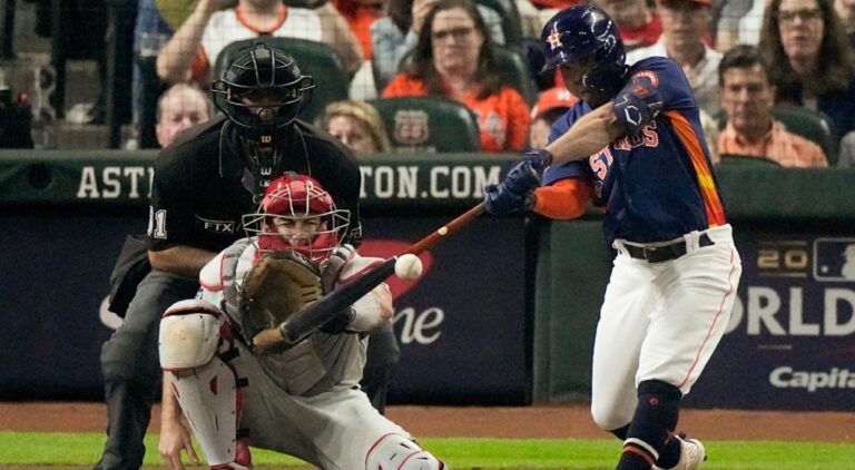 Altuve breaks out with three hits as Astros even World Series