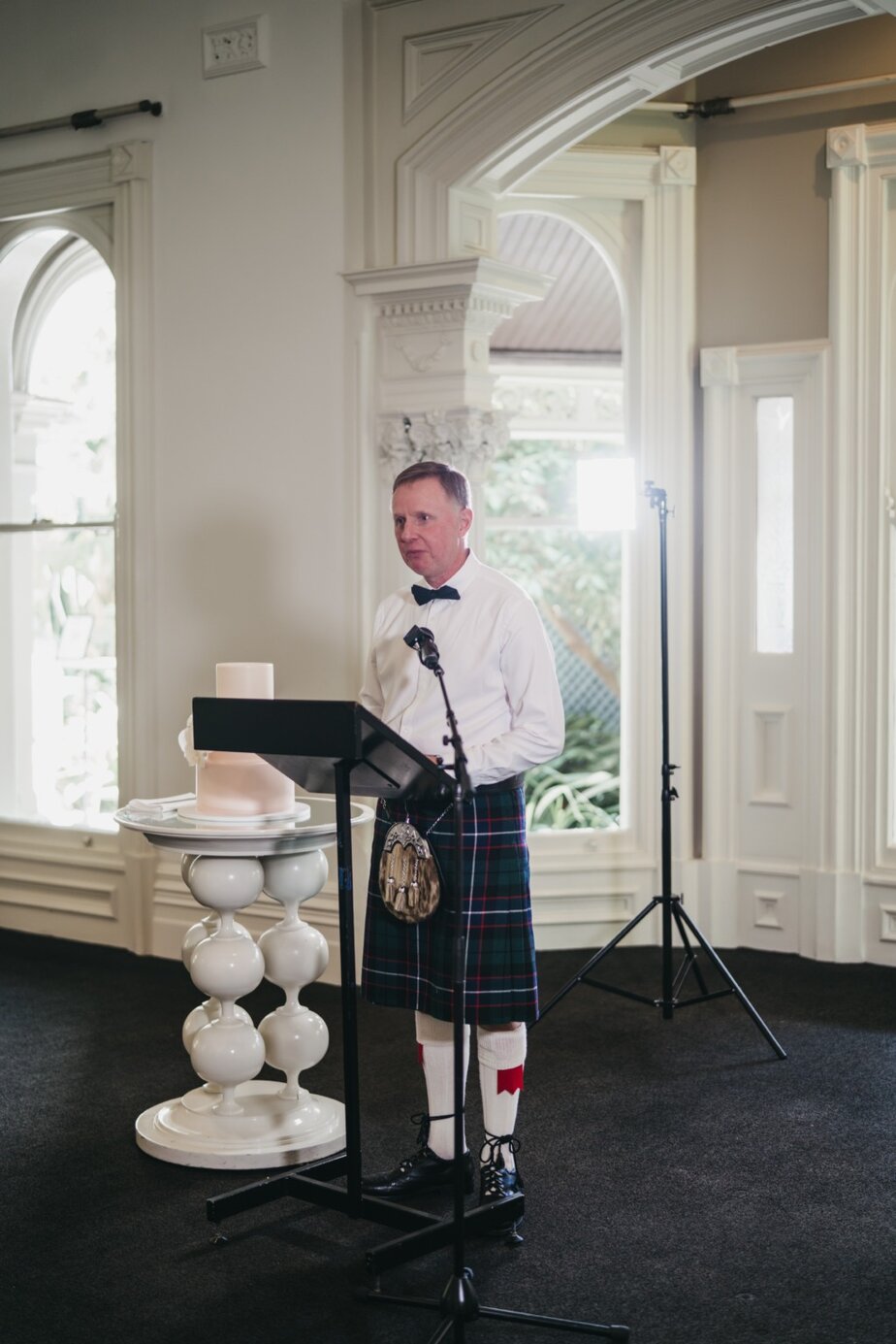 Father gives speech wearing kilt