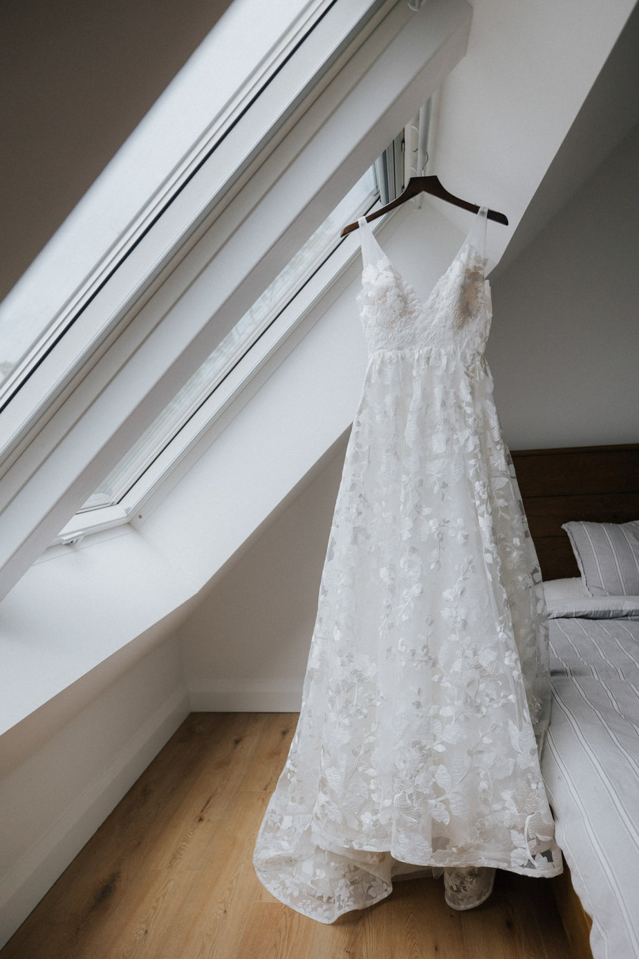 White bridal gown dress is hanging