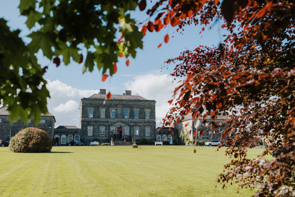 Shot of manor wedding venue red leaves
