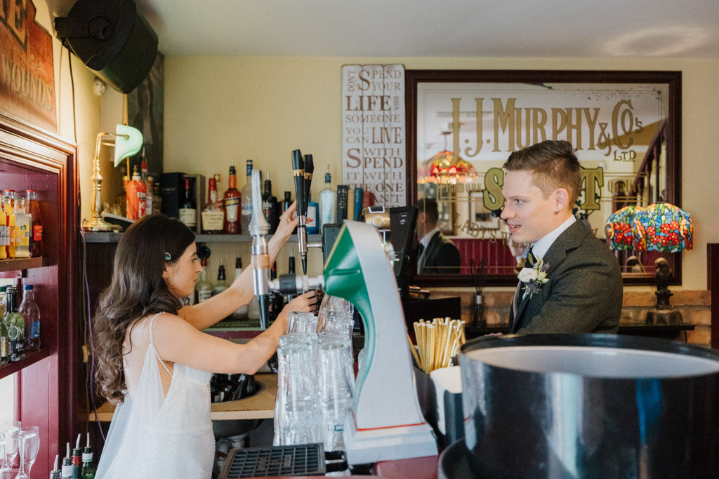 Bride and groom bar pub pints beer