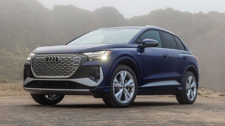 2024 Audi Q4 e-tron with a foggy hill in the background.