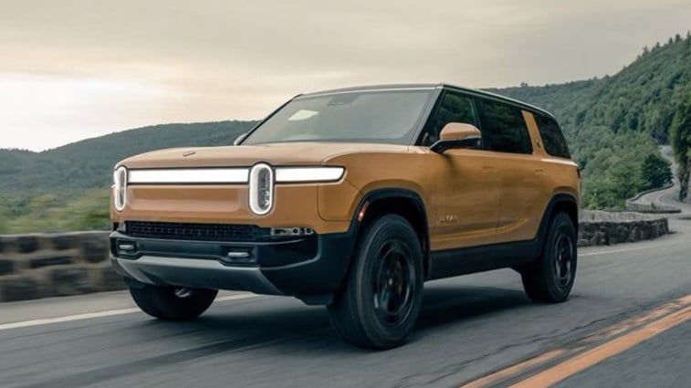 The 2024 Rivian R1S seen from a front quarter angle