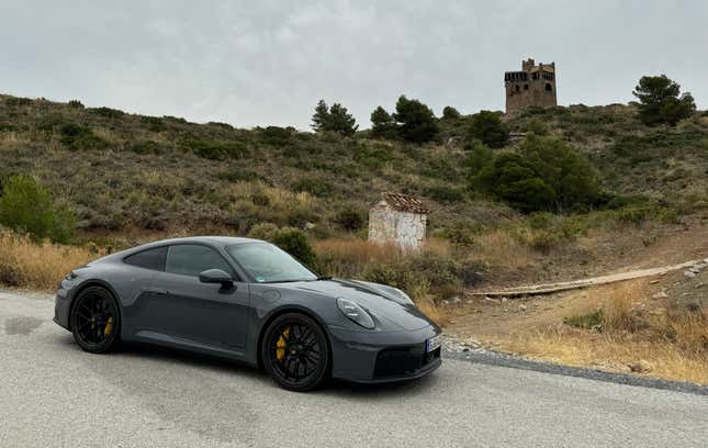 Front 3/4 view of a grey Porsche 911 GTS