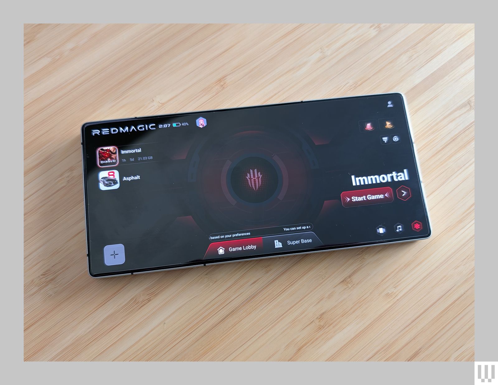 Overhead view of Nubia Redmagic 10 Pro with a video game loading on the screen