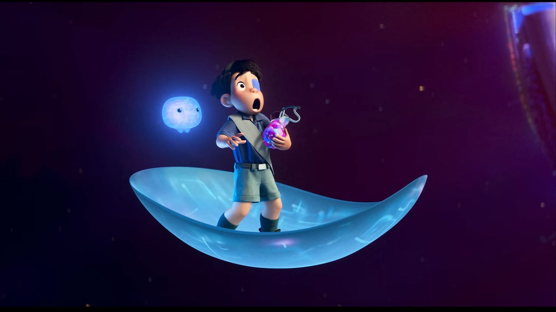 Elio is swept into the Communiverse, a journey once meant to reflect deeper themes of identity, many of which were altered or removed during production. (Image via Pixar)