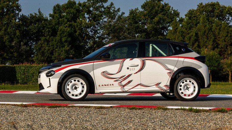 Side view of a white Lancia Ypsilon HF Racing