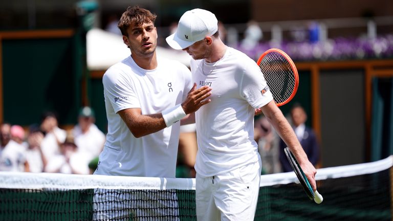 Jack Pinnington Jones (right) following his defeat to Flavio Cobolli on day four of the 2025 Wimbledon Championships at the All England Lawn