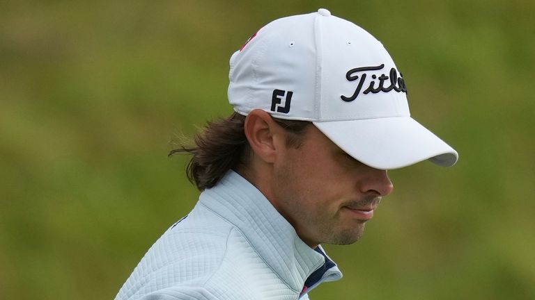Jacob Skov Olesen of Denmark walks off 7th green during the first round of the British Open golf championship at the Royal Portrush Golf Club, Northern Ireland, Thursday, July 17, 2025. (AP Photo/Francisco Seco)