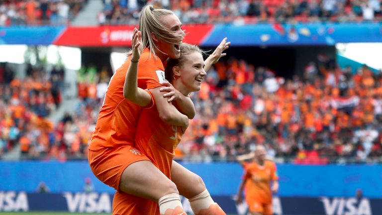 Netherlands' scorer Vivianne Miedema, right, and her teammate Netherlands'Jill Roord, left, celebrate their side's 3rd goal during the Women