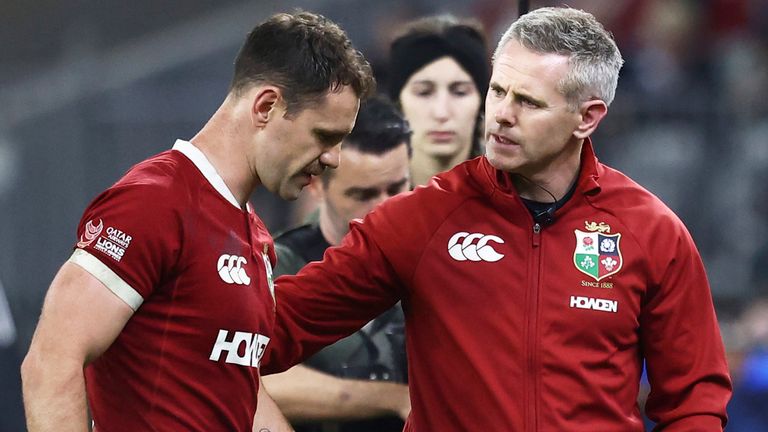 Tomos Williams of the British & Irish Lions is assisted from the field during the match against Western Force 