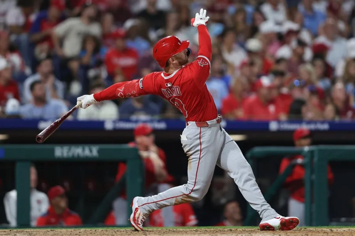 Jul 18, 2025; Philadelphia, Pennsylvania, USA; Los Angeles Angels outfielder Taylor Ward (3) hits a two RBI home run against the Philadelphia Phillies during the seventh inning at Citizens Bank Park. Mandatory Credit: Bill Streicher-Imagn Images