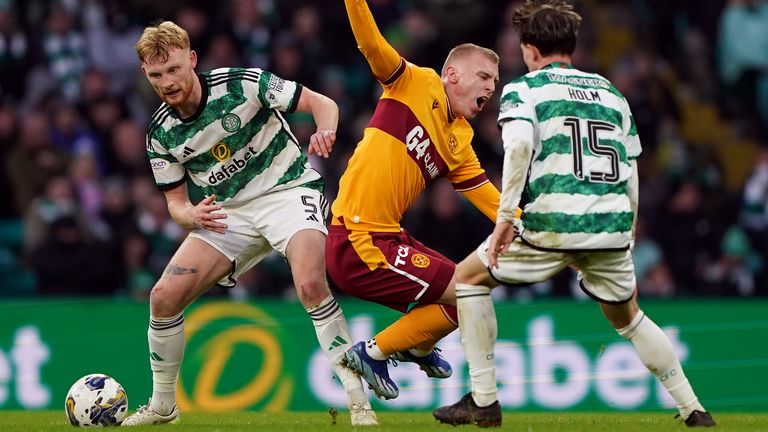 Motherwell's Mika Biereth is tackled by Celtic's Liam Scales during the Premiership match at Celtic Park, Glasgow.