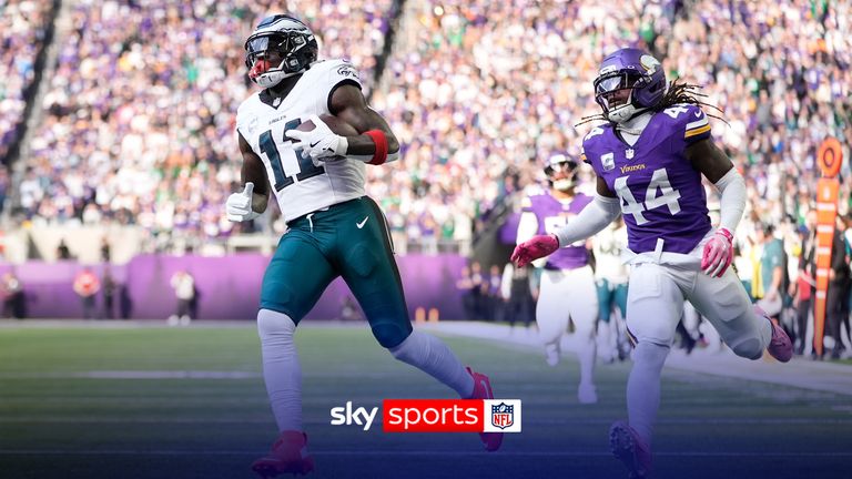 Philadelphia Eagles wide receiver A.J. Brown (11) scores a touchdown past Minnesota Vikings safety Joshua Metellus (44) during the first half of an NFL football game Sunday, Oct. 19, 2025, in Minneapolis. (AP Photo/Abbie Parr)