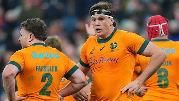 Tom Hooper of Australia interacts with teammate Matt Faessler.