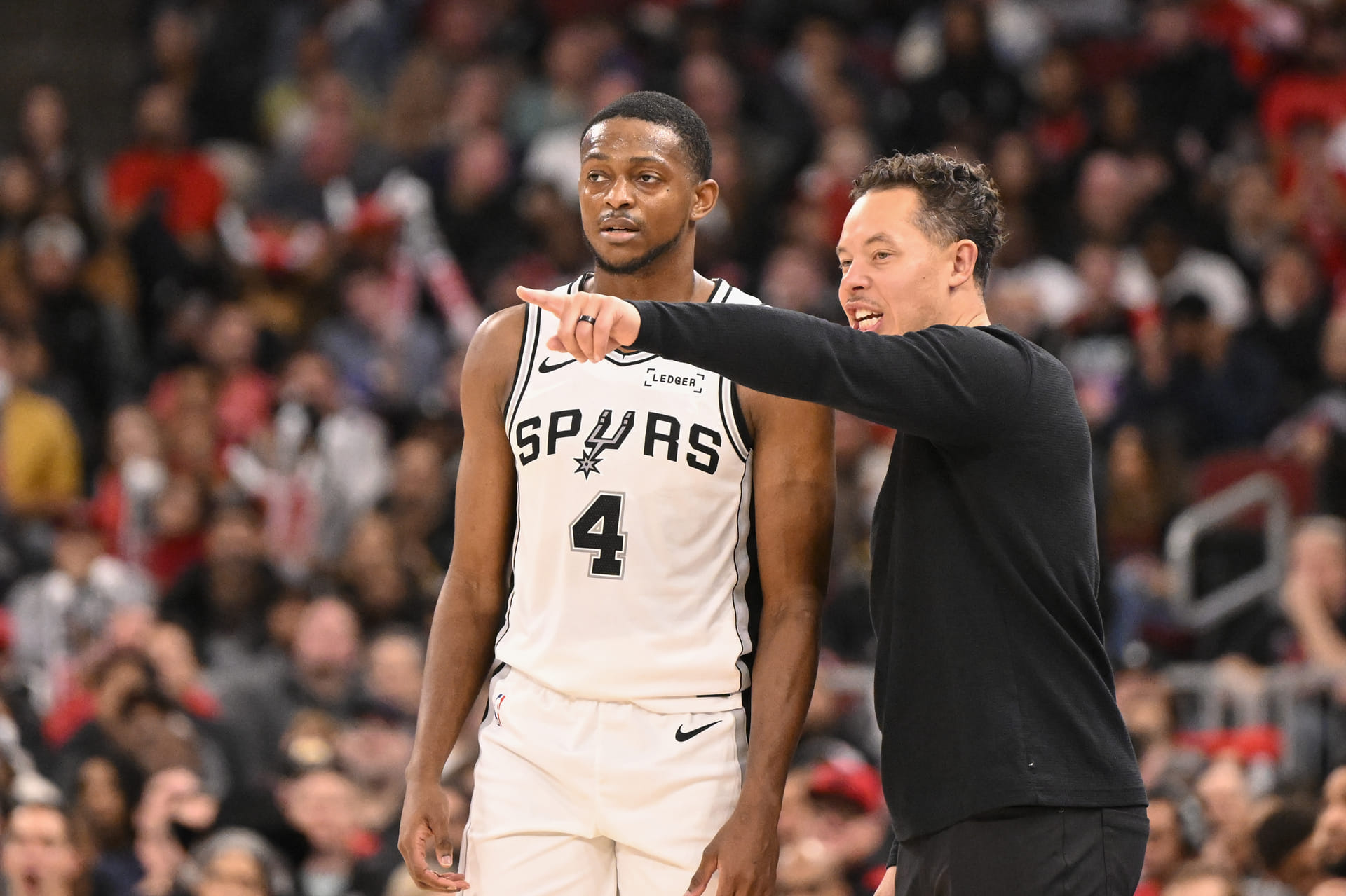 De'Aaron Fox and Mitch Johnson of the San Antonio Spurs. (Photo: IMAGN)