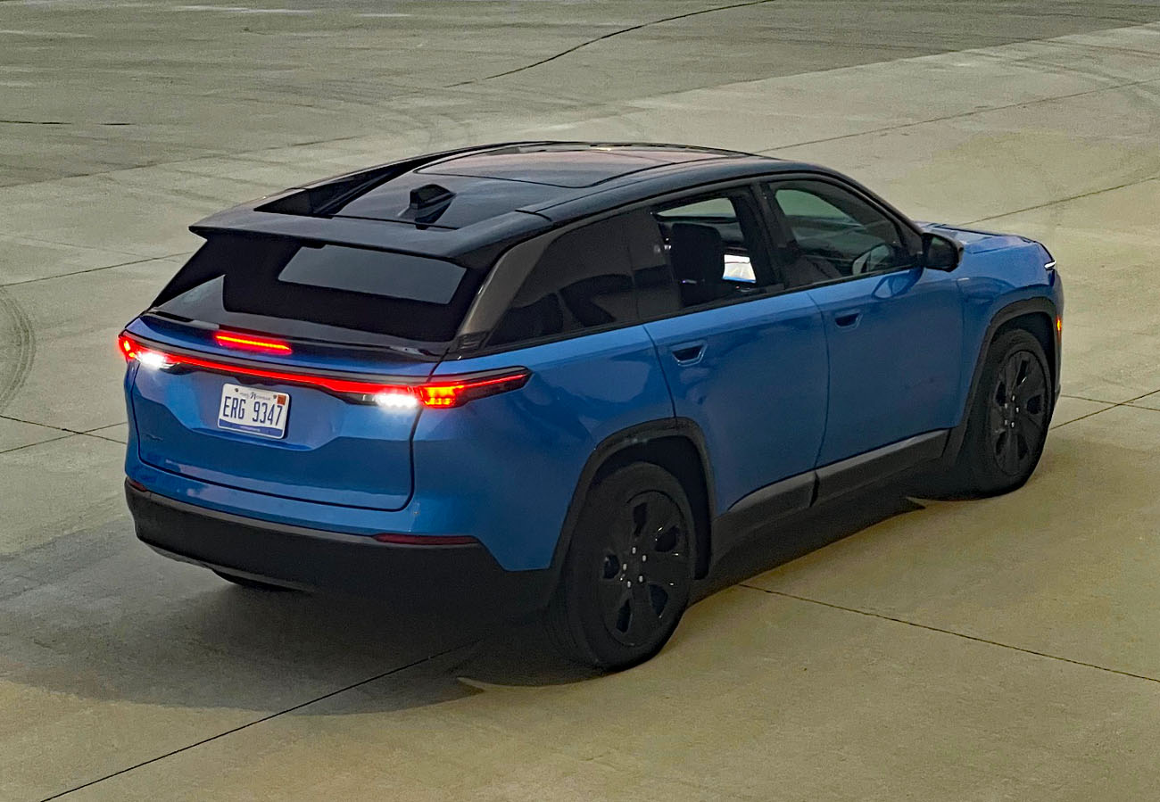 2025 Jeep Wagoneer S Launch Edition in Hydro Blue Pearl, rear 3/4 view,