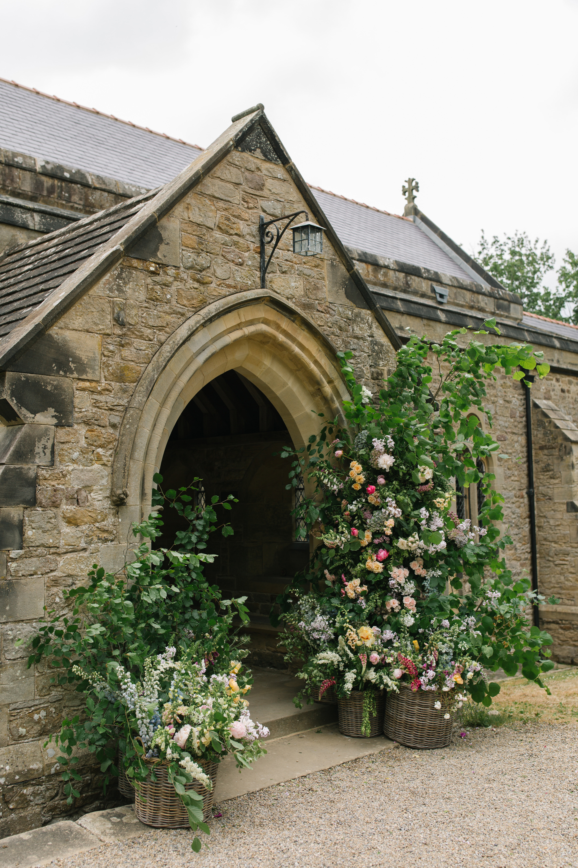 Maisie Wore Jessica Bennett for Her Spring Pastel Flower Filled Wedding at Middleton Lodge 29 Spring Pastel Church Wedding Middleton Lodge Feverfew Florist Nell Mallia Photography7 1