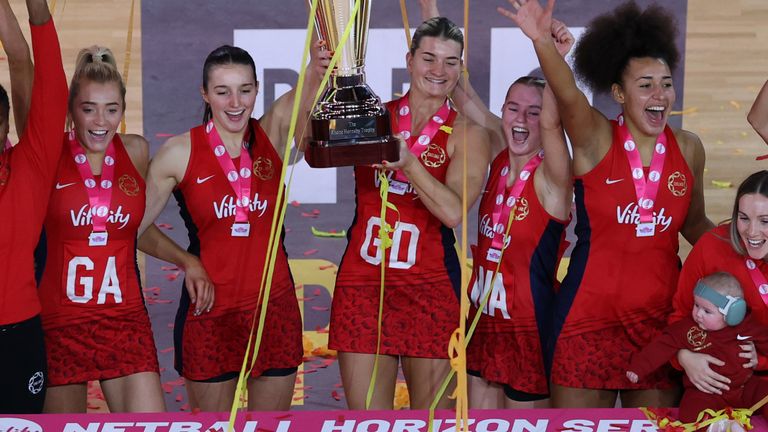Francesca Williams lifts the trophy after victory over Jamaica in the Vitality Netball Horizon Series