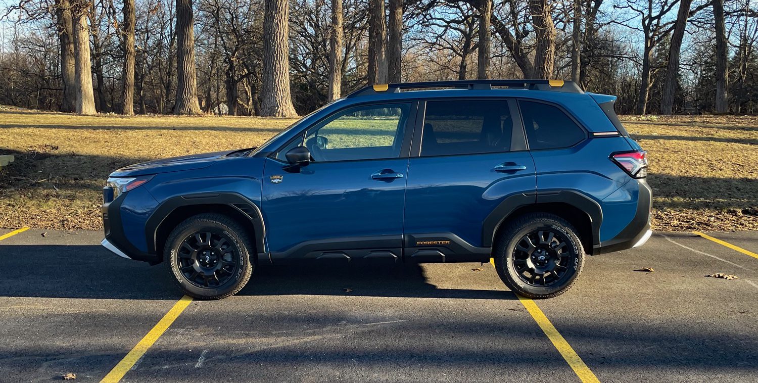 2026 Subaru Forester Wilderness in Geyser Blue, profile, in park, sunset