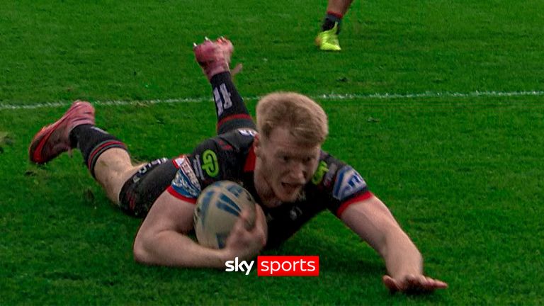 Zach Eckersley finishes a sweeping Wigan move after a series of offloads and quick hands 