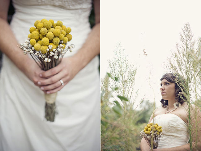 DIY bouquet of yellow billy balls on bare stems with small white berries and a twine handle