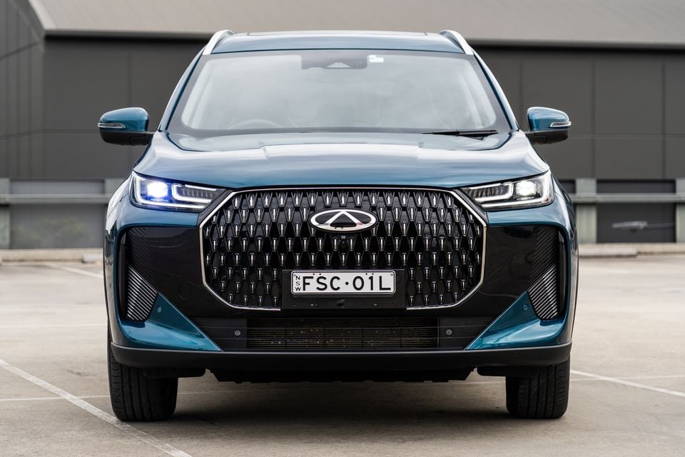 Front view of a teal 2026 Chery Tiggo 7 Super Hybrid SUV with NSW plates, parked in a car park
