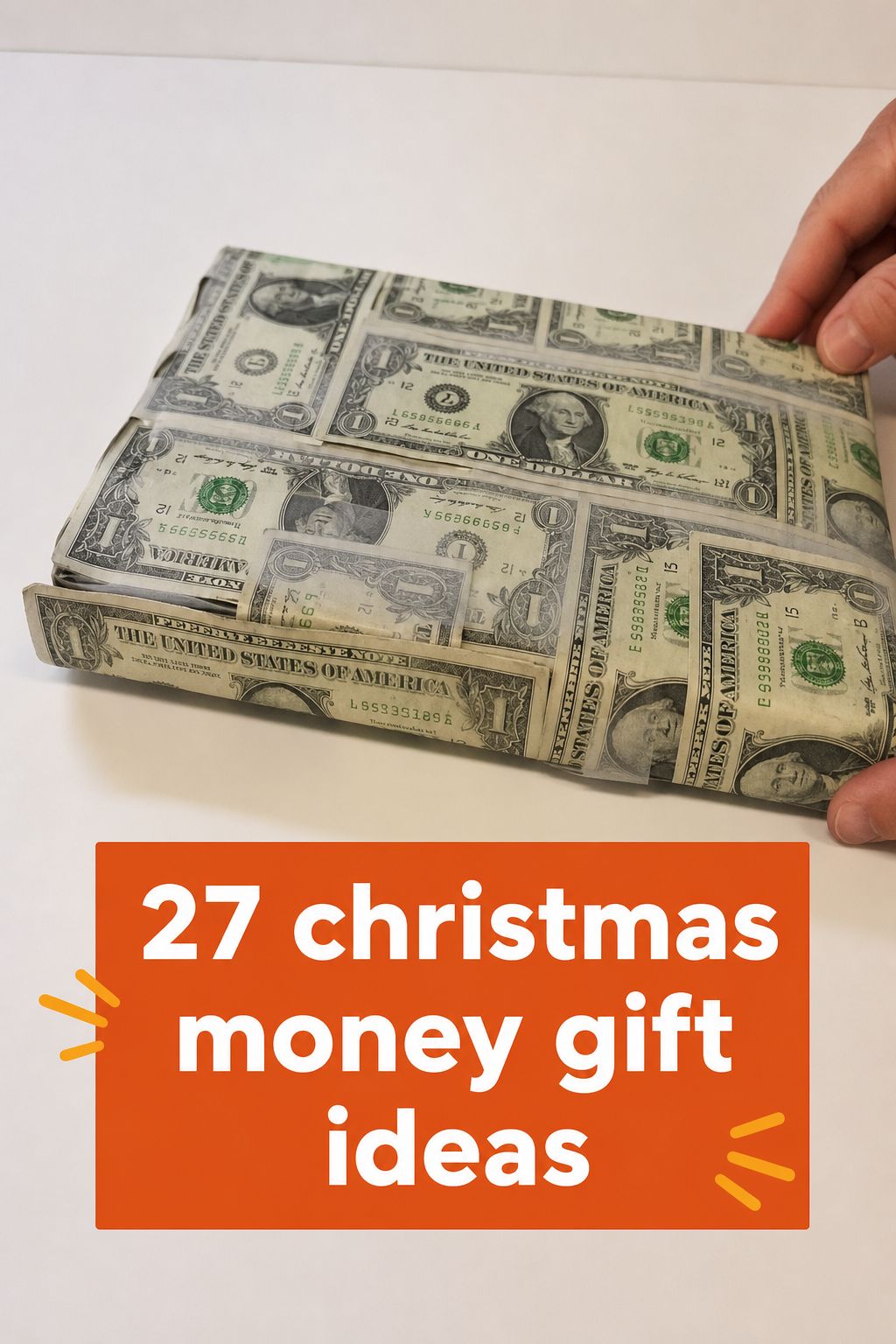 A book wrapped in dollar bills is held by a hand. Overlaid text reads, “27 Christmas money gift ideas” with small decorative lines—perfect inspiration for anyone looking to give money for Christmas in creative ways.