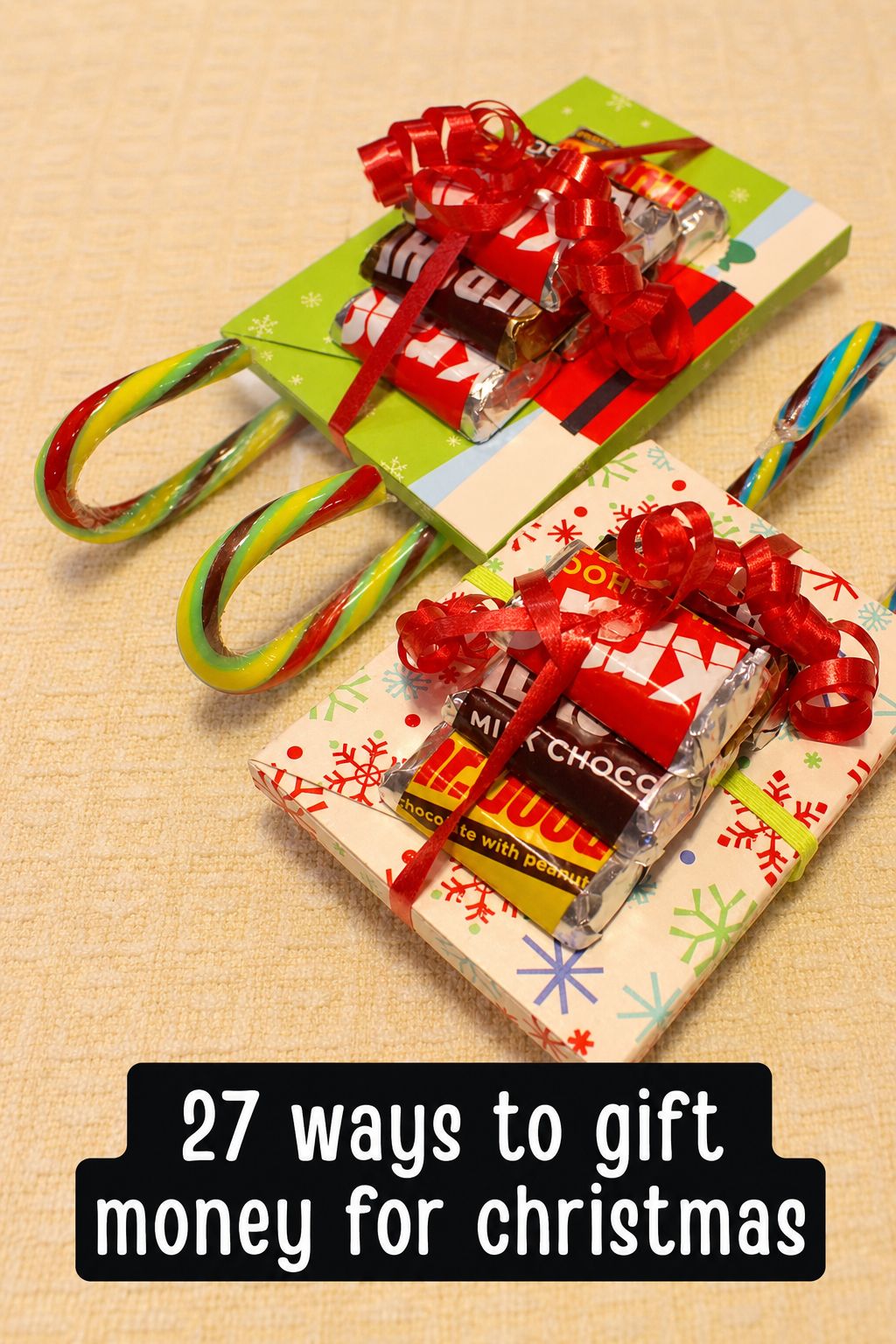 Two Christmas presents decorated with chocolate bars, bows, and candy canes, arranged to resemble sleds. Text reads: “27 creative ways to give money for Christmas.”.