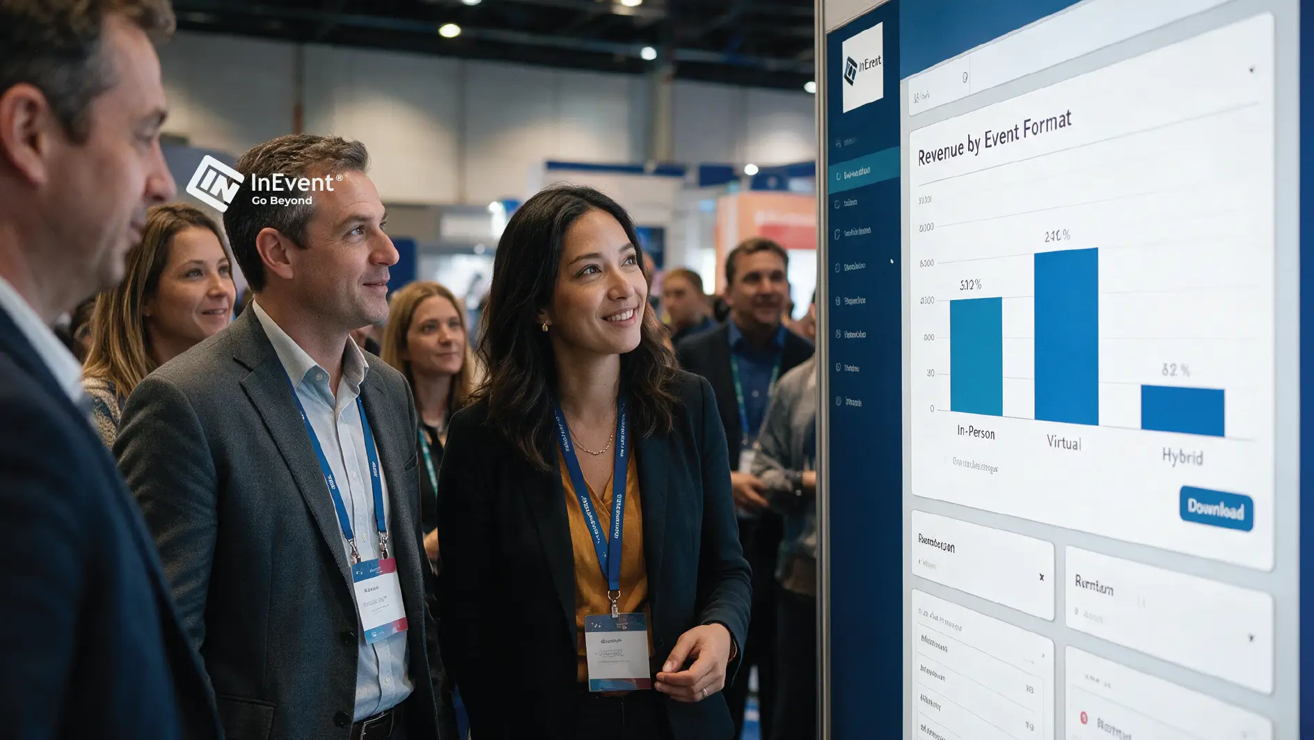 Conference attendees gather around a digital display showing an event-format bar chart, creating a professional, engaged atmosphere at a trade show.