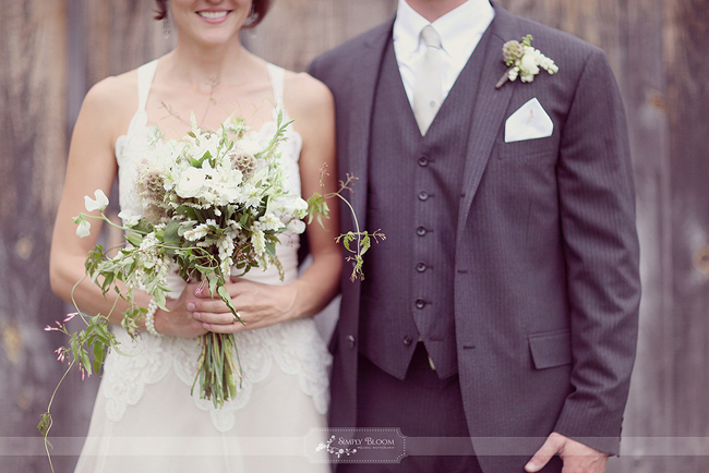 Loose white and green bouquet with wild trailing tendrils