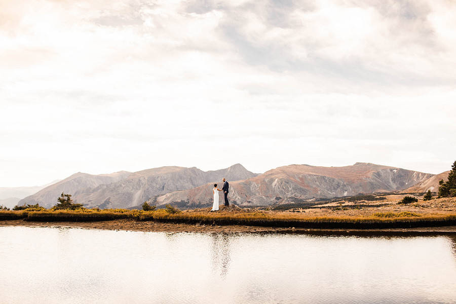 Couple in a historic greenhouse at the Denver Botanic Gardens micro-wedding