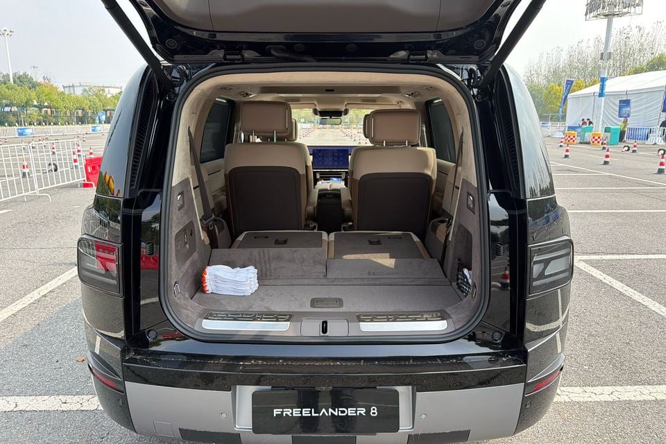 Rear view of the Freelander 8 with its tailgate open and third row folded