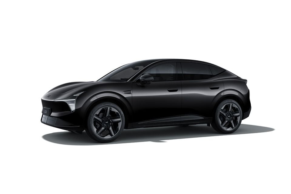 A black Xpeng P7 performance sedan shown in a front quarter studio shot on a white background