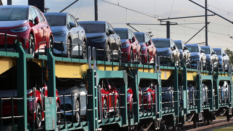 Long freight train carrying new cars from Volkswagen plant near Glauchau in Saxony