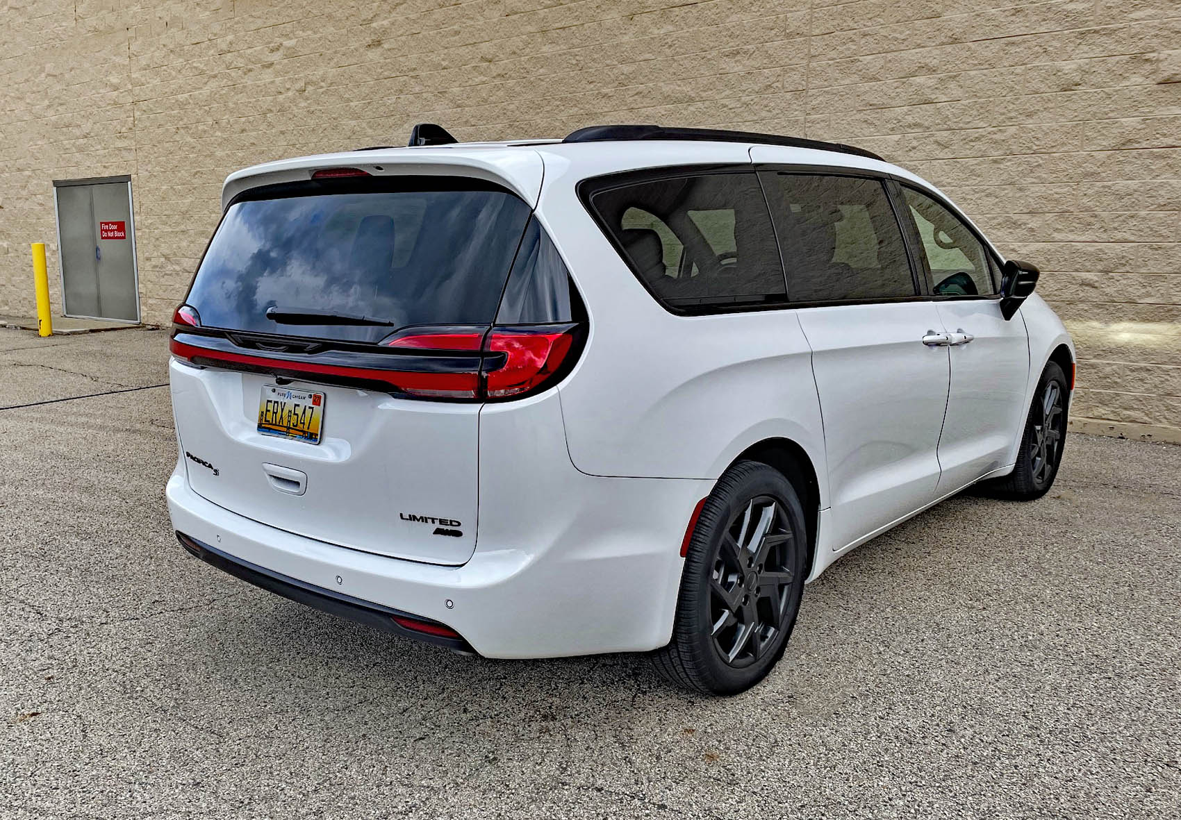 2027 Chrysler Pacifica Limited in Bright White with S Appearance Package, rear 3/4 view,