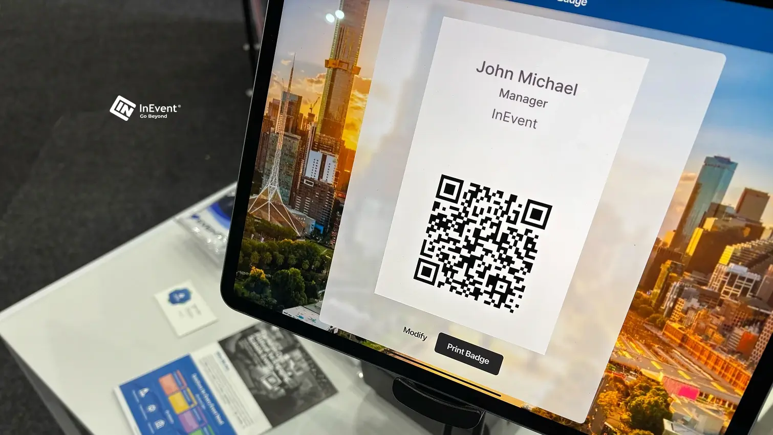 Badge printing and check-in screen showing guest arrivals