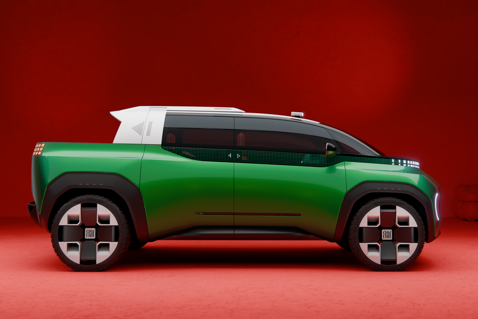 A green Fiat Multi-Play concept pickup with a white roof shown side-on in a red studio